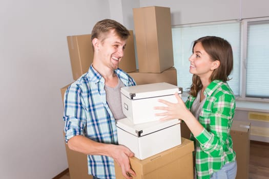 Young Couple Moving In To New Home Together.