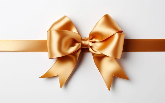 Shiny color satin ribbon on white background. Christmas gift, valentines day, birthday wrapping element. Decorative golden bow with long ribbon isolated Festive