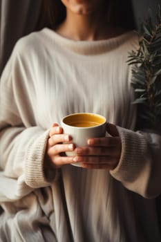 unrecognizable beautiful young woman relaxing over a cup of tea. AI Generated