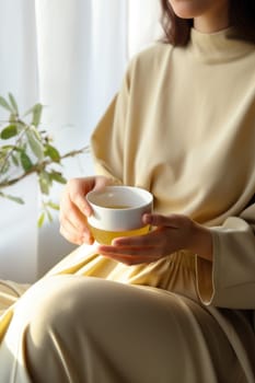 unrecognizable beautiful young woman relaxing over a cup of tea. AI Generated