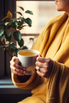 unrecognizable beautiful young woman relaxing over a cup of tea. AI Generated