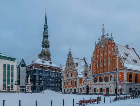 House of the Chernoglovs and St. Peter's Church in Old Riga in winter, Christmas holidays 1