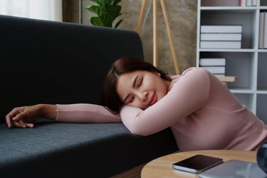 asian young woman sleeping on sofa at home, relaxing concepts