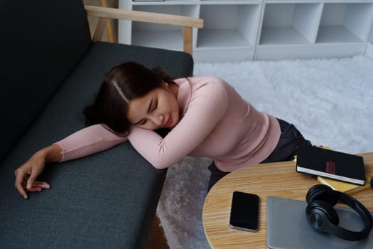 asian young woman sleeping on sofa at home, relaxing concepts