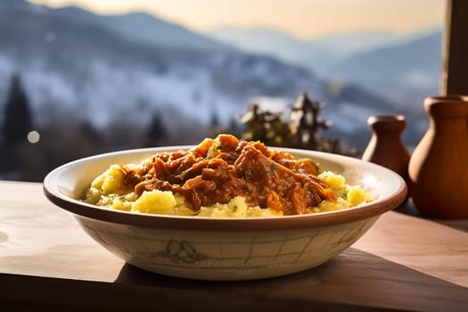 Cassoeula, traditional Lombardy dish with a stew made with pork meat and cabbage, often served with polenta. Italian seasonal comfort dish.