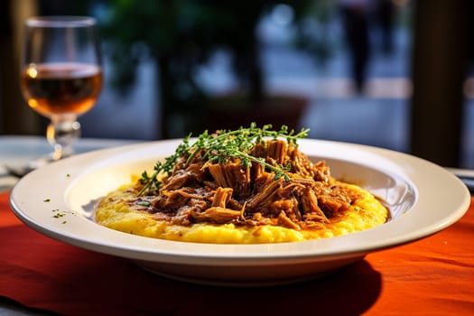 Cassoeula, traditional Lombardy dish with a stew made with pork meat and cabbage, often served with polenta. Italian seasonal comfort dish.