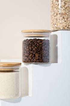 Reusing Glass Jars To Store Dried Food Living Sustainable Lifestyle At Home, copy space. coffee beans in glass jar