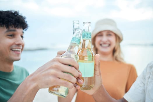 Beer, toast and friends in celebration at the beach for holiday, summer and freedom to travel together. Group of people cheers with alcohol to celebrate a party, vacation and relax by the sea.