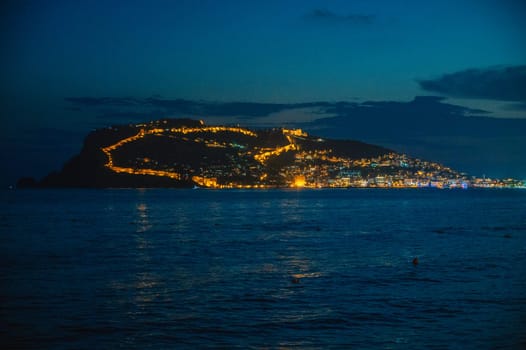 Beautiful night scene on Alanya beach in Turkey
