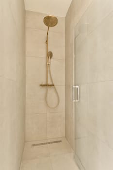 a walk in shower that is very clean and ready to be used for the next day's washroom