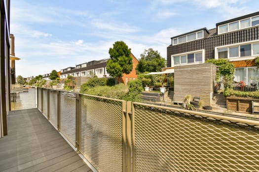 an outside area with some houses and trees on the other side of the photo is clear blue skies in the sky