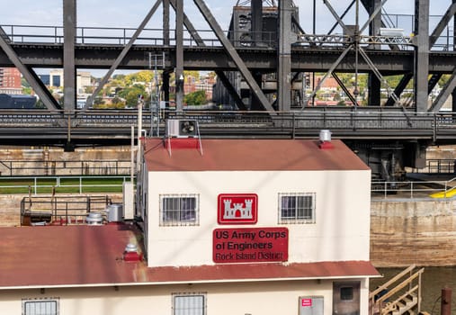 Army Corps of Engineers barge with offices enters Lock and Dam No. 15 in Davenport, Iowa