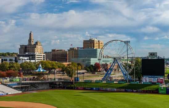 Davenport, IA - 18 October 2023: Dismantling fairground rides in amusement park for winter