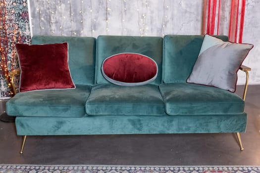 Exhibition of modern stylish upholstered furniture in the showroom of a furniture store. pillows