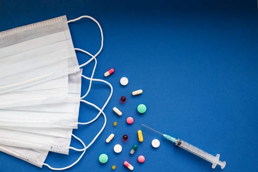 Coronavirus in China. the new coronavirus 2019-nCoV , pills and white medical mask.