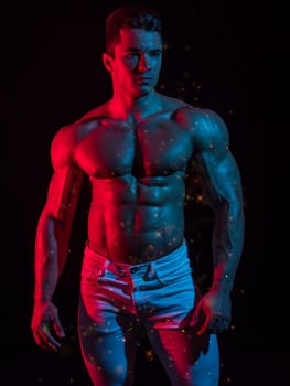 A Strong Display of Masculinity: Flexing Muscles and Striking a Pose in Studio. A man posing for a picture while flexing his muscles