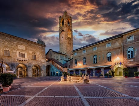 Piazza Vecchia in Bergamo, Italy, with Contarini fountain, Palazzo della Ragione, Palazzo del Podesta and Campanone tower