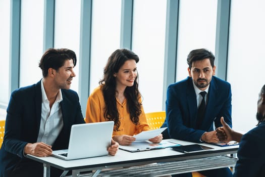 Diversity recruiters interview candidate at the bright office. A group of human resources professionals explaining an applicant for a new position. asking interviewee a question. Intellectual.