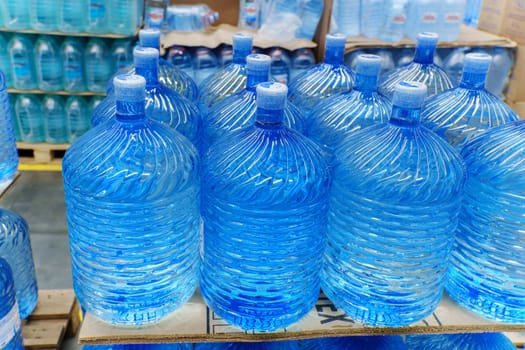 Sale of clean drinking water in a hypermarket. Clean water. Selective focus