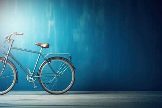 Blue bicycle with a basket in an empty room near a blue wall.