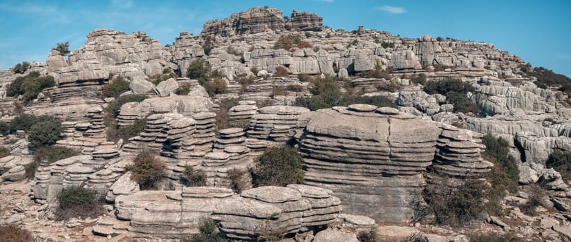 Spectacular layered rock formations created by erosion in Torcal de Antequera, a unique natural landscape.