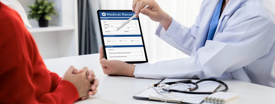 Laptop display medical report or diagnostic result of patient health on blurred background of doctor's appointment in hospital. Medical consultation and healthcare treatment. Panorama Rigid