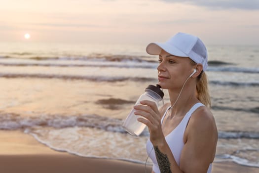 a girl of European appearance in sportswear stands outdoors, portrait of a girl in sportswear. High quality photo