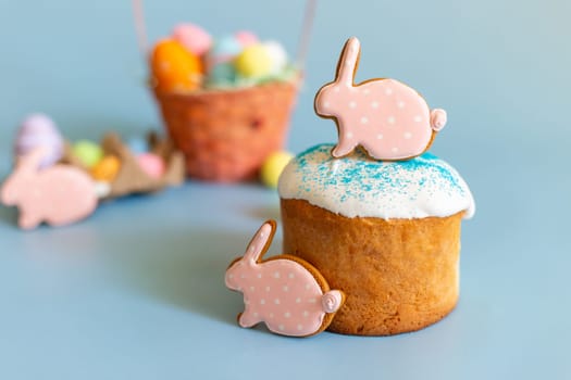 Easter still life with gingerbread in the form of a rabbit on an Easter cake.