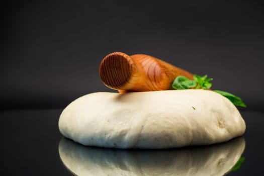 homemade yeast soft dough, isolated on black background