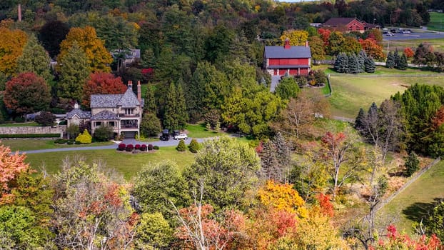 Elizabethtown, Pennsylvania, October 22, 2023 -An Aerial View of a Beautiful Estate, With a Pond, Gazebo and Many Buildings on an Autumn Day