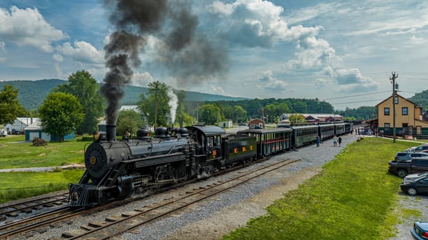 Rockhill Furnace, Pennsylvania, August 5, 2023 - Narrow Gauge Steam Passenger Train, Getting Ready to Leave Orbisonia Station With a Train Full of Passengers on a Sunny