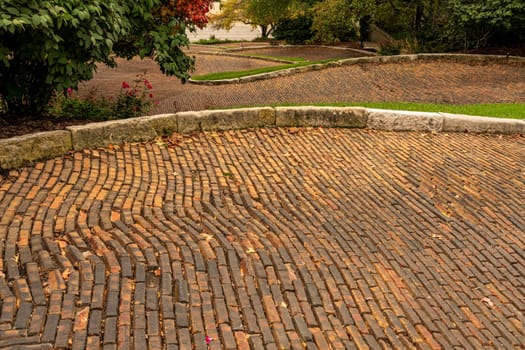 Patterns in the brick paving on Snake Alley in Burlington Iowa which has the world record for steepest bendy street