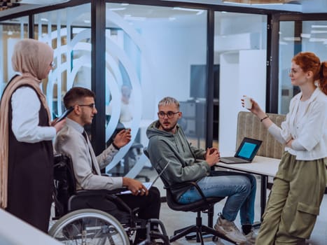 Young group of business people brainstorming together in a startup space, discussing business projects, investments, and solving challenges