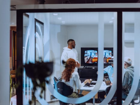 A diverse group of businessmen collaborates and tests a new virtual reality technology, wearing virtual glasses, showcasing innovation and creativity in their futuristic workspace.