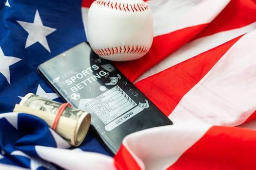 Baseball ball on a background of the American flag on light .Horizontal. High quality photo
