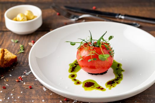 Tomato Caprese salad with mozzarella and micro sprouts