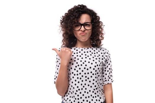 young energetic curly secretary woman dressed in black and white blouse.
