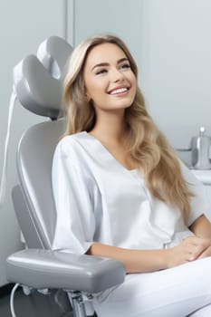 European young woman smiling happily while sitting in medical chair at dental clinic. AI Generated