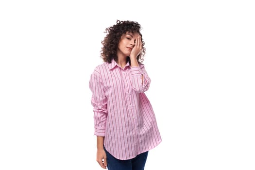 young office worker woman dressed in a striped pink shirt on a white background.