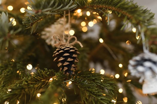 Cone toy hanging on the christmas tree