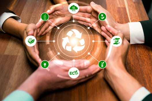 Business partnership form circular hand together around recycle icon symbolize ESG sustainable environment and ecosystem protection with eco recycling technology and waste reduction. Reliance