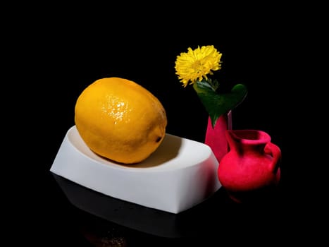 Creative still life with lemon bathing on a black background