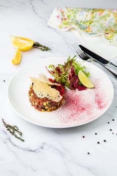 meat salad with arugula and lime