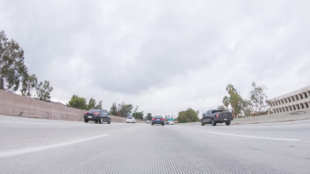 Los Angeles, California, USA-December 4, 2022-POV-Amidst a rainy winter day, driving on HWY 134 near Los Angeles, California, captures the atmosphere through raindrop-covered lenses, adding a unique and moody perspective to the journey.