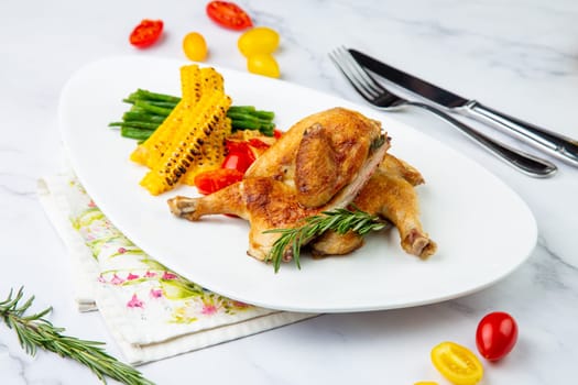 chicken thighs with corn, cherry tomatoes and herbs