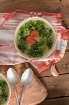 Caldo verde popular soup in Portuguese cuisine. traditional ingredients for caldo verde are potatoes, collard greens , olive oil and salt. Additionally garlic or onion may be added.