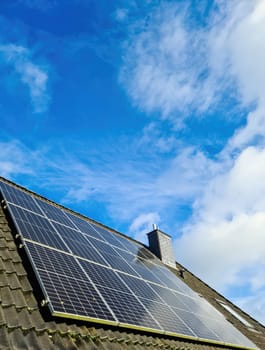 Solar panels producing clean energy on a roof of a residential house