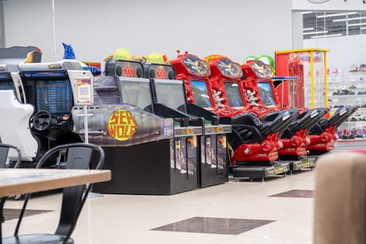 13.06.2023, Novosibirsk, Russia. Arcade games kids slot machines at trade center.