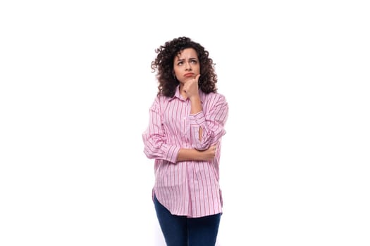 portrait of a young office secretary woman dressed in a striped pink shirt on a white background.