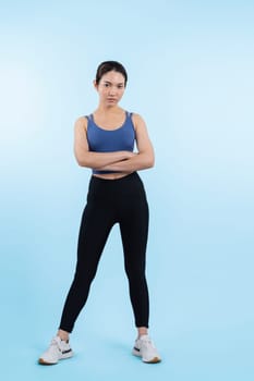 Full body asian woman in sportswear portrait, smiling and posing cheerful gesture. Workout training with attractive girl engage in her pursuit of healthy lifestyle. Isolated background Vigorous